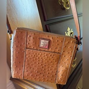 Barely carried, chestnut colored “ostrich”embossed, leather Dooney crossbody